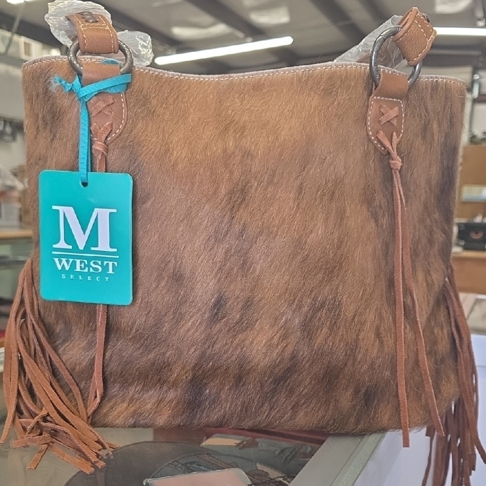 Montana West hair on and fringe tote.